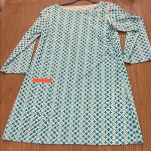 Geometric Patterned Dress with Orange Accent